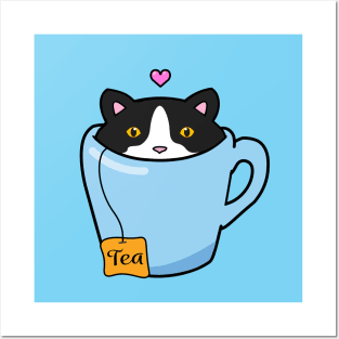 Sweet tuxedo cat sitting in a blue cup of tea Posters and Art